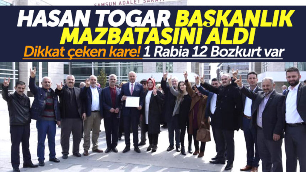 Hasan Togar mazbatasını alırken bir kişi Rabia, 12 kişi ise Bozkurt selamı verdi